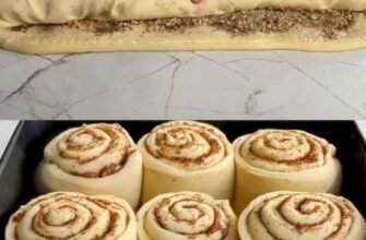 Rulouri moi și pufoase cu scorțișoară și nuci, glazurate cu cremă de brânză