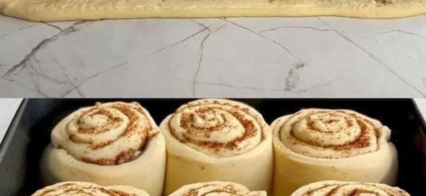 Rulouri moi și pufoase cu scorțișoară și nuci, glazurate cu cremă de brânză
